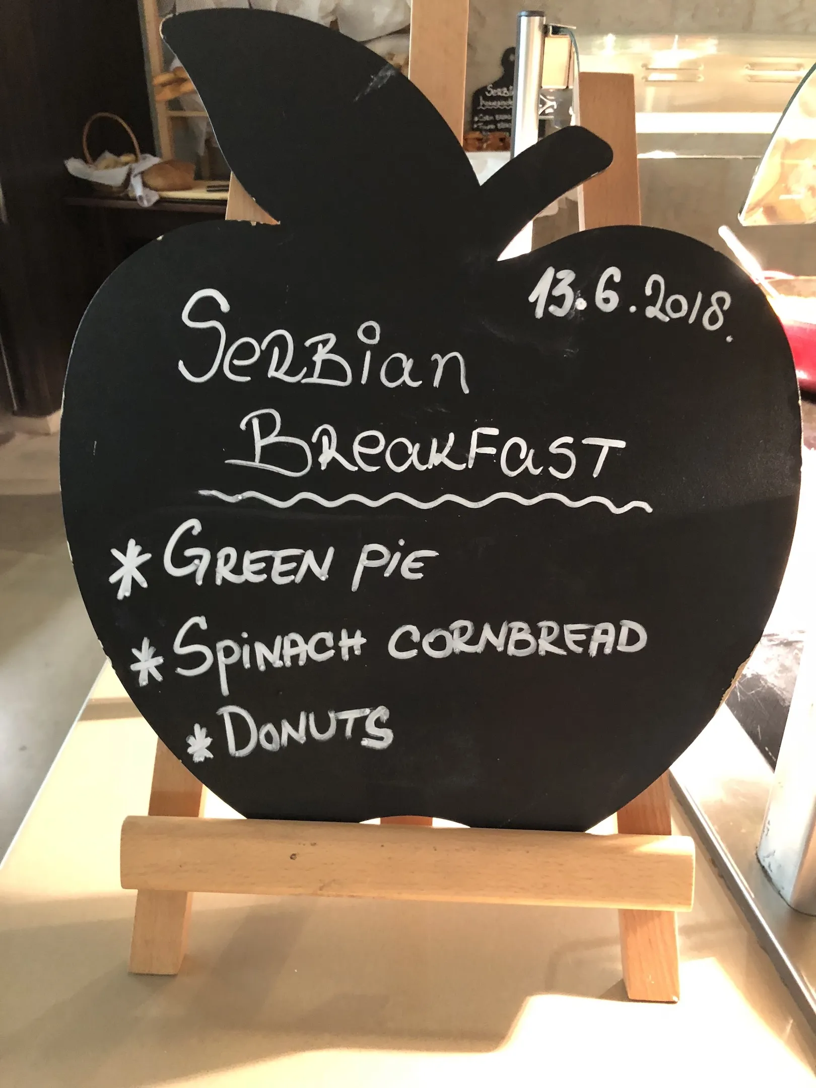 A menu offering donuts for breakfast