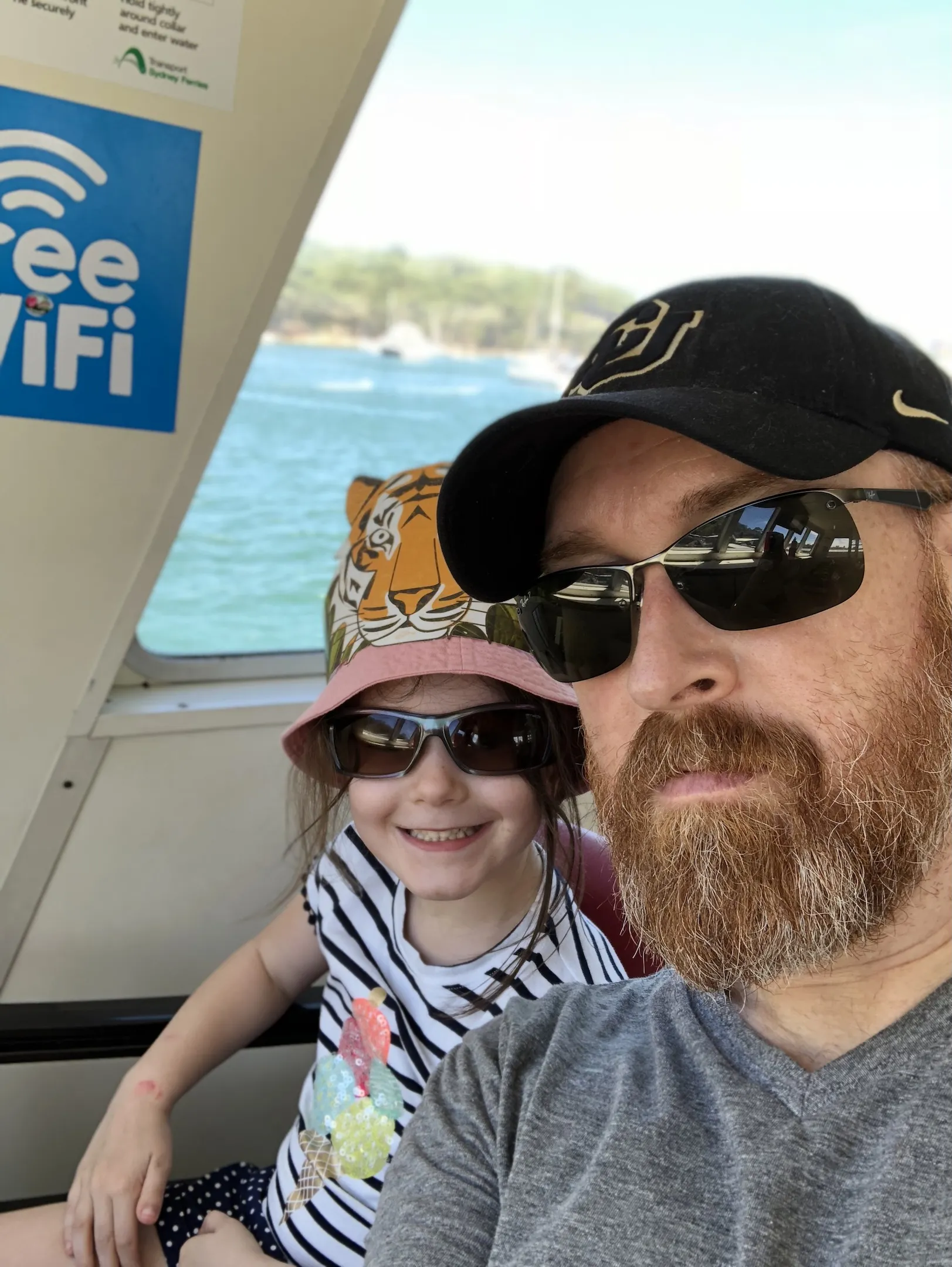 A father and daughter on a ferry