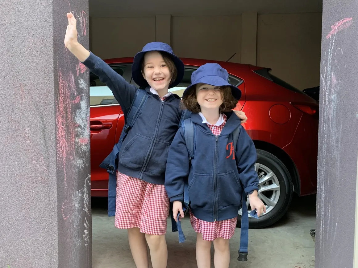 Two children in school uniform