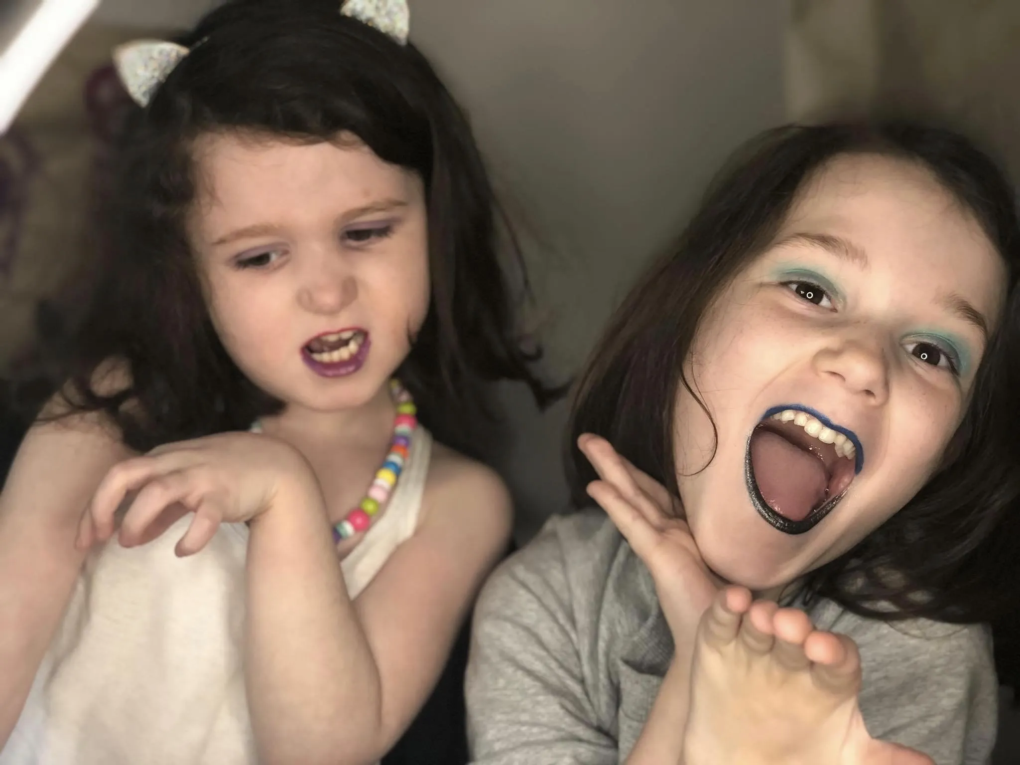 Children playing with makeup