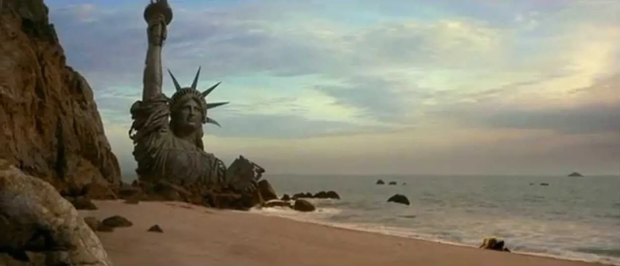 A still from Planet of the Apes showing the torso of the Statue of Liberty (oops, spoilers)