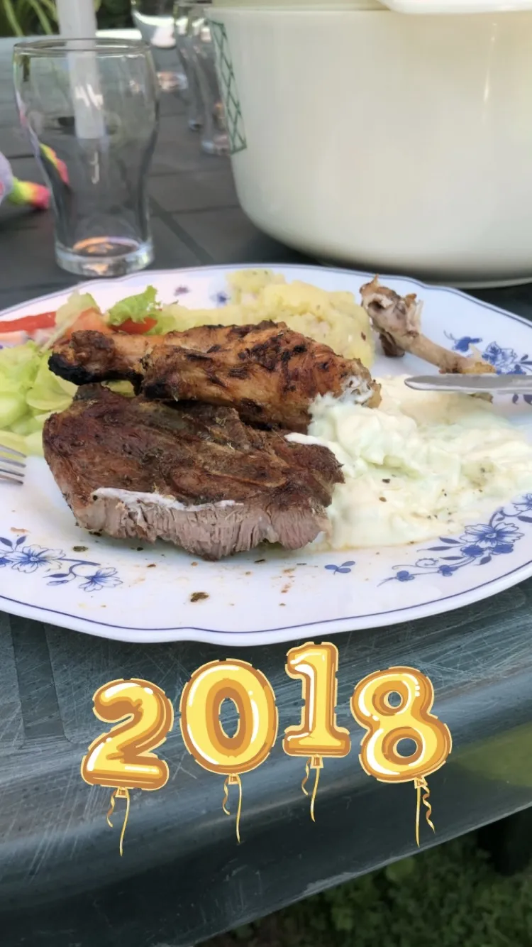 A social media image with a 2018 decoration over a lamb chop