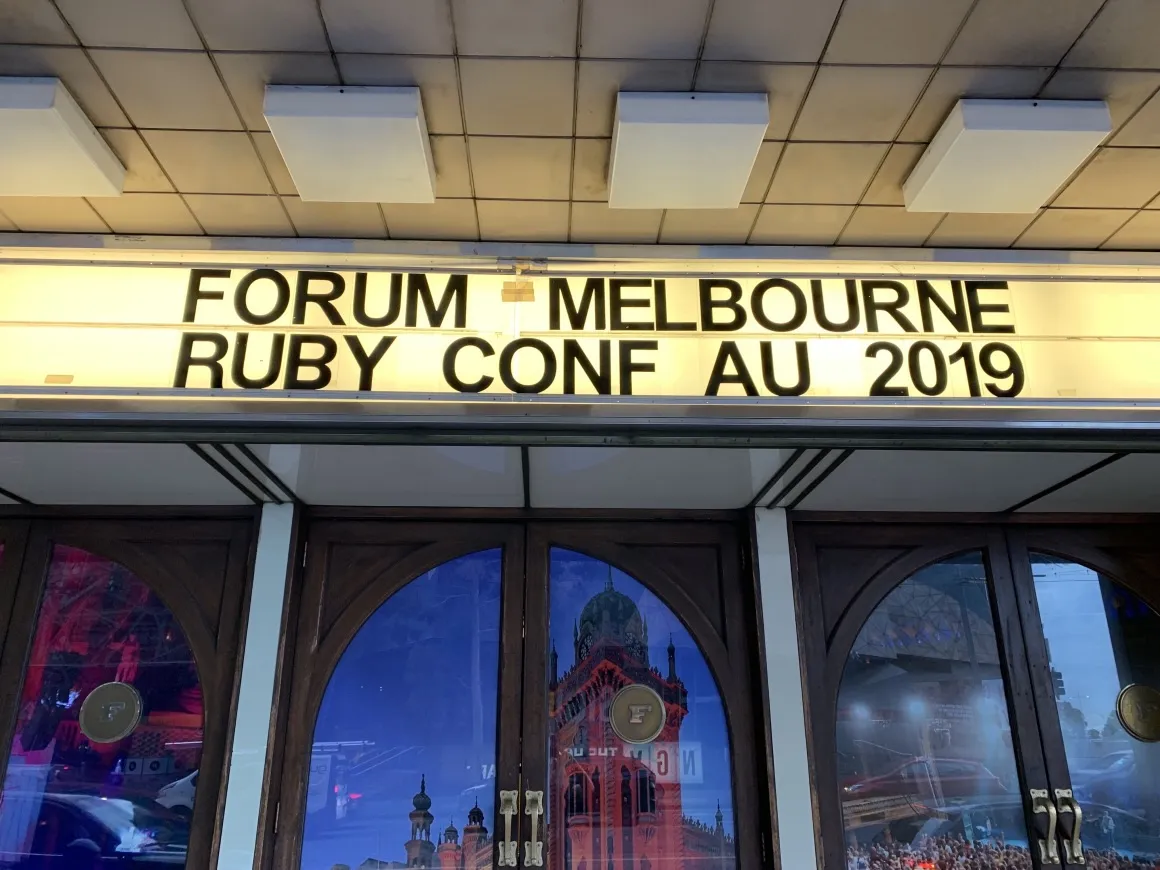 A sign reading RubyConf AU 2019